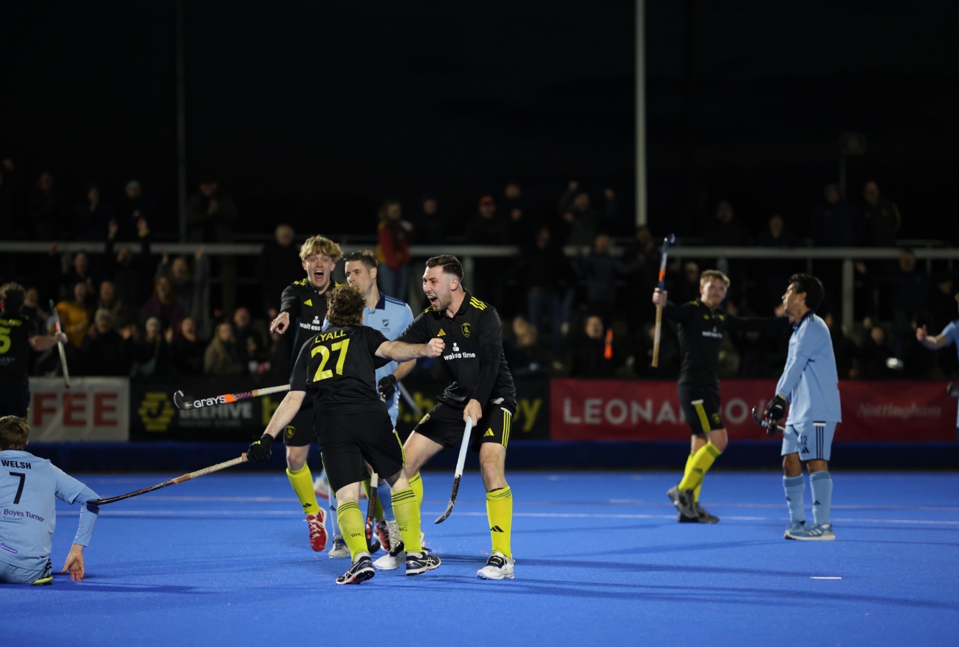 Beeston Men's 1st players celebrate during the 4-1 win over Reading at Nottingham Hockey Centre