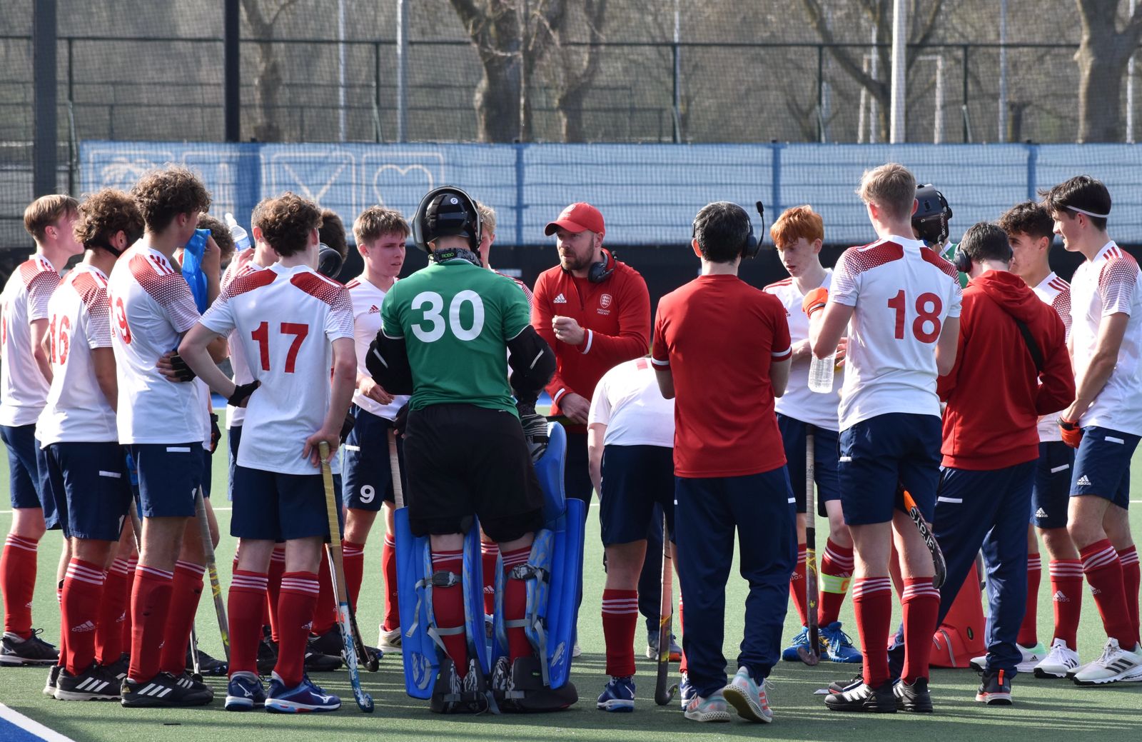 Mark Bateman speaking to players during an England Hockey team talk